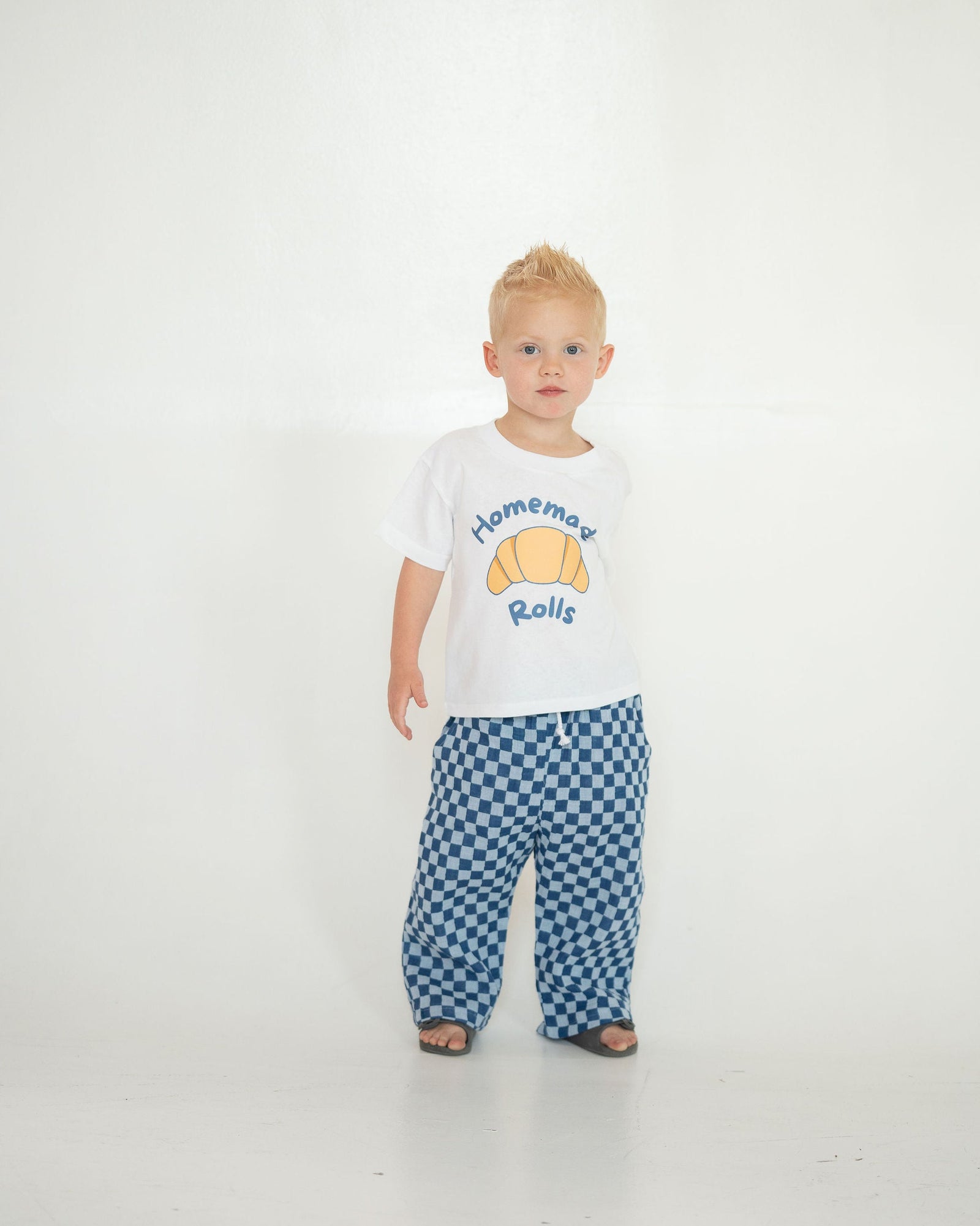 Blue and white checkered pants on a light gray background