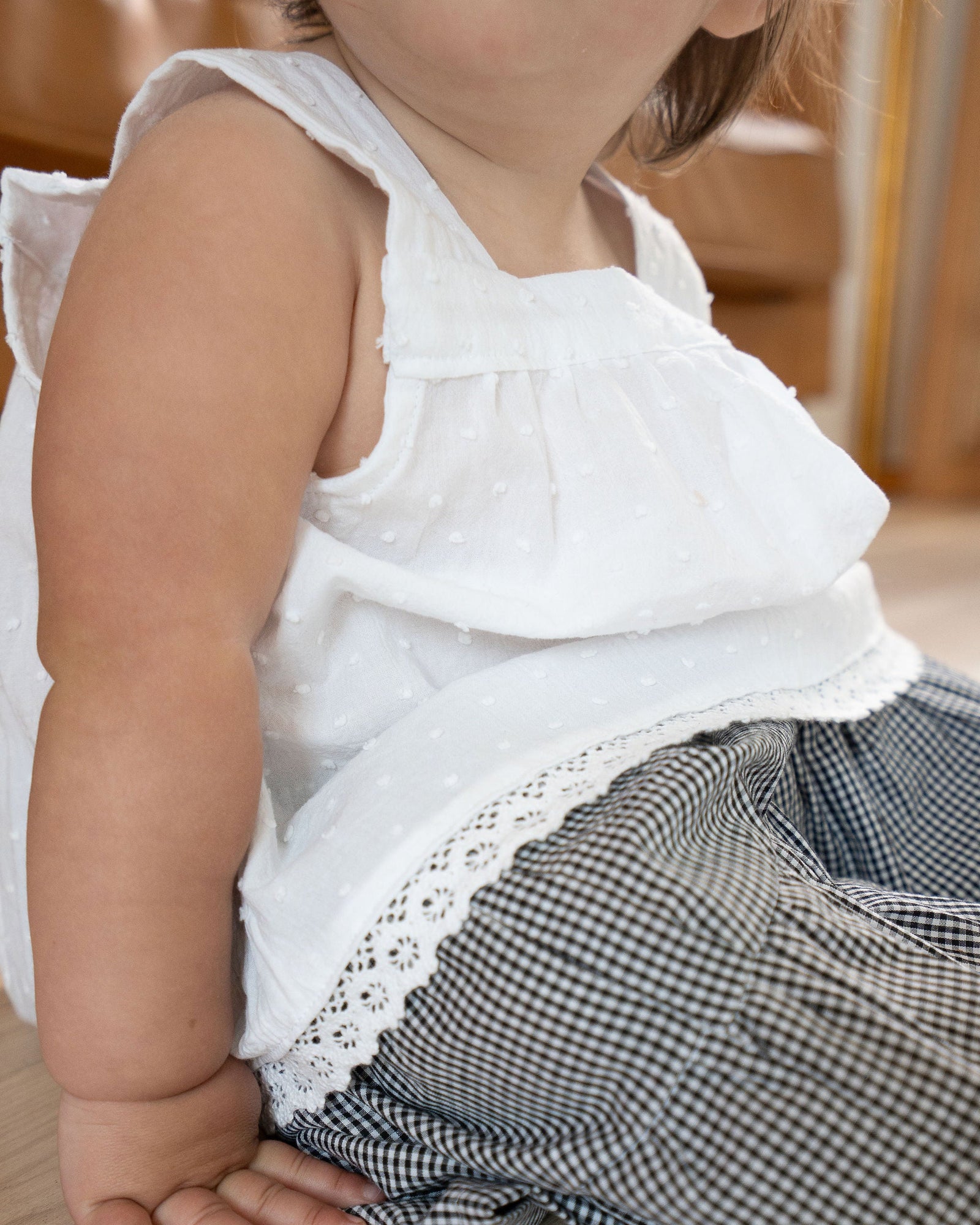 White lace dress on a white background