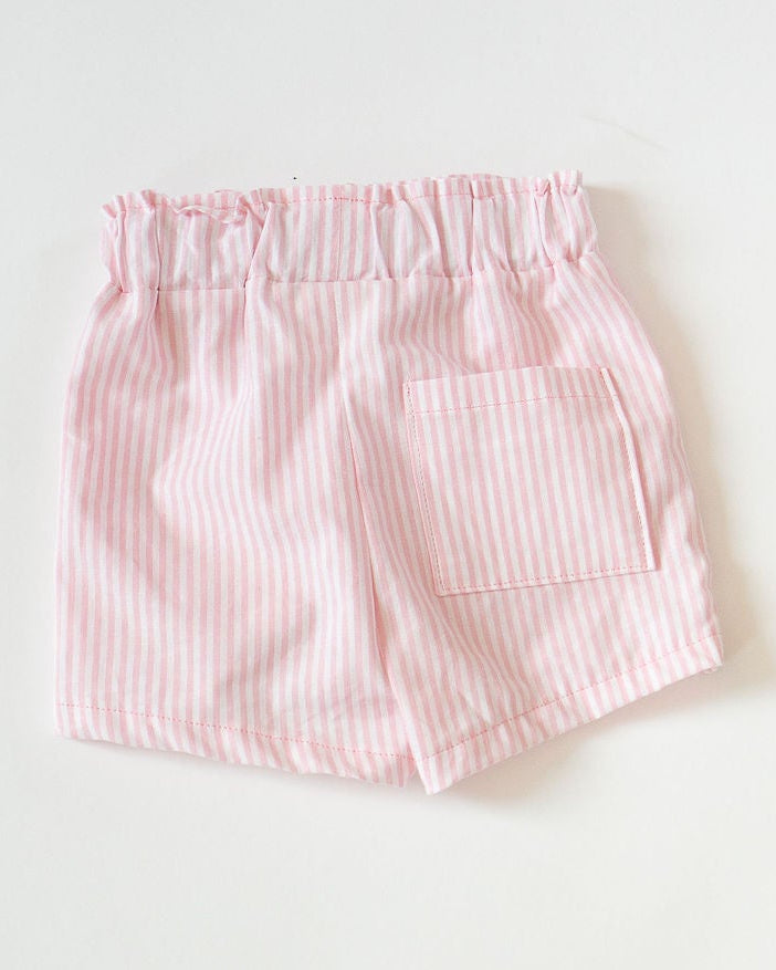 Pink striped shorts on a white background