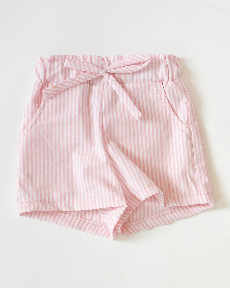 Pink striped shorts on a white background