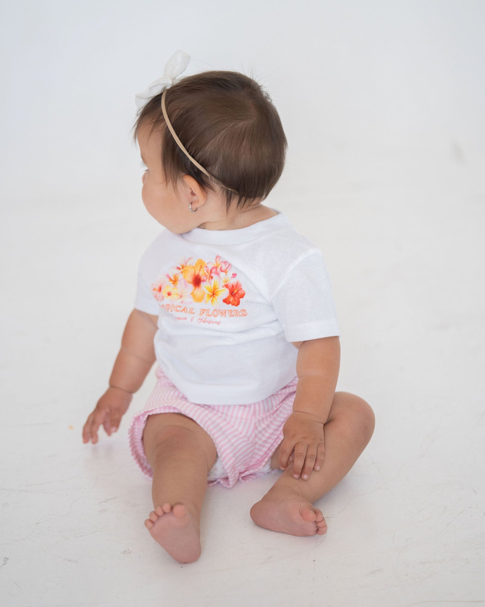Pink striped shorts on a white background